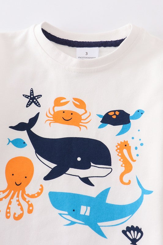 White marine creature print boy top